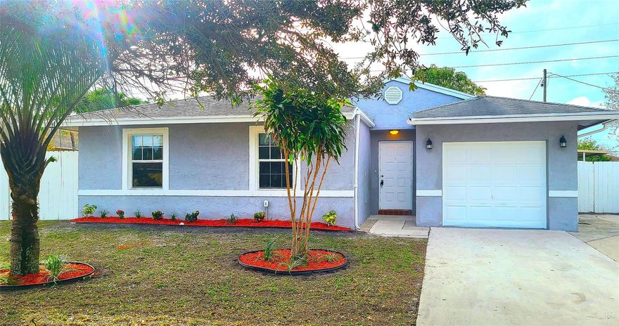 Welcome Home! NO HOA ! Beautiful 4 Bedroom 2 Bath plus 1 Car Garage. Boasting and open floor plan with vaulted/cathedral ceilings in living area, European designer kitchen with granite counter tops, New stainless steel appliances, large primary suite w/ensuite, indoor laundry, 1 car garage, LARGE fenced in yard, plenty of parking.  This home has it all. Located near Hunters Manor Park, Harrah's THE POMP, shopping, dining, entertainment easy access to I95 and Florida's Turnpike.