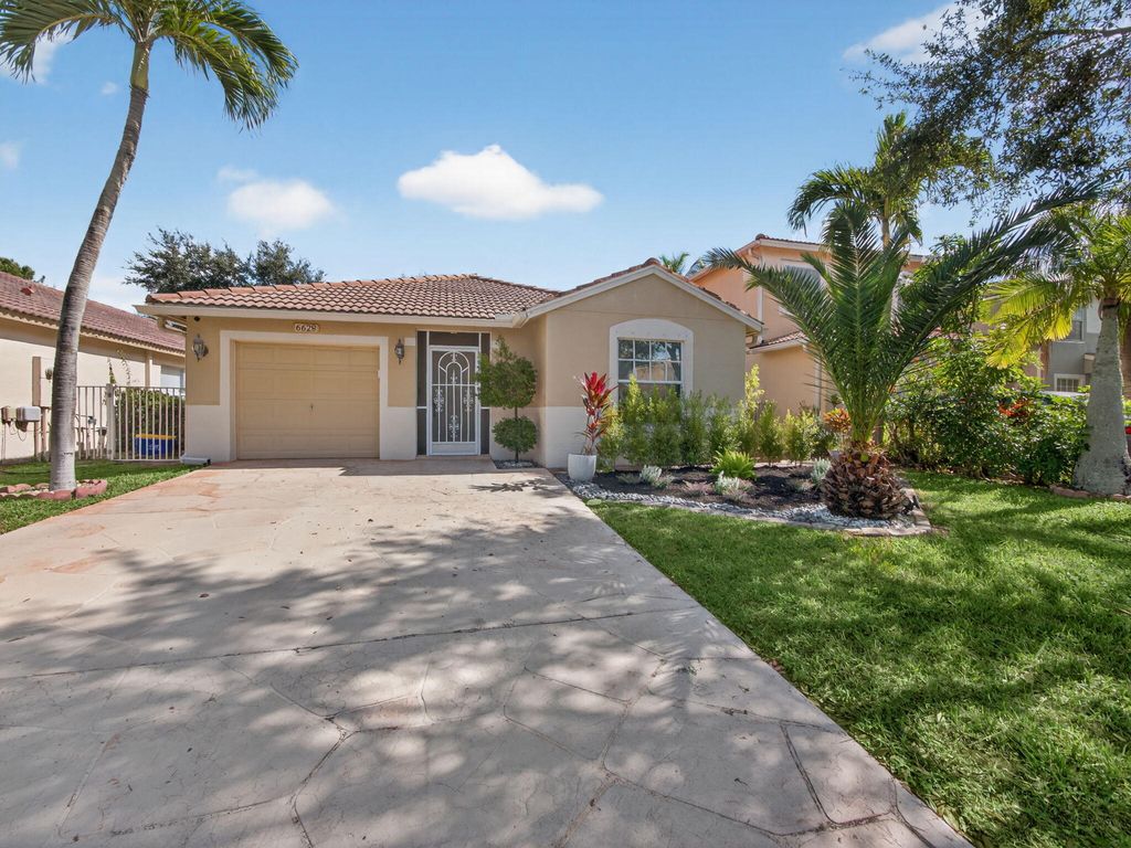 Photo of 6628 Country Winds Cove, Lake Worth, FL 33463 (MLS # R11140687)