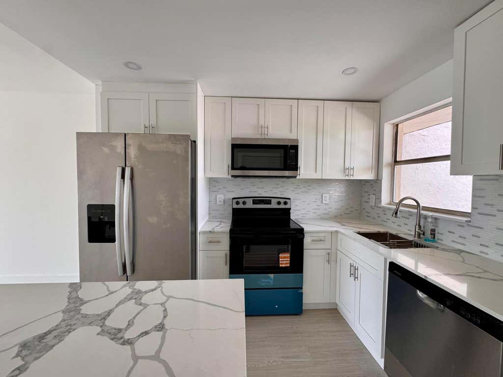 Photo of 2831 E Sunrise Lakes Drive E #311, Sunrise, FL 33322 (MLS # B26042428)