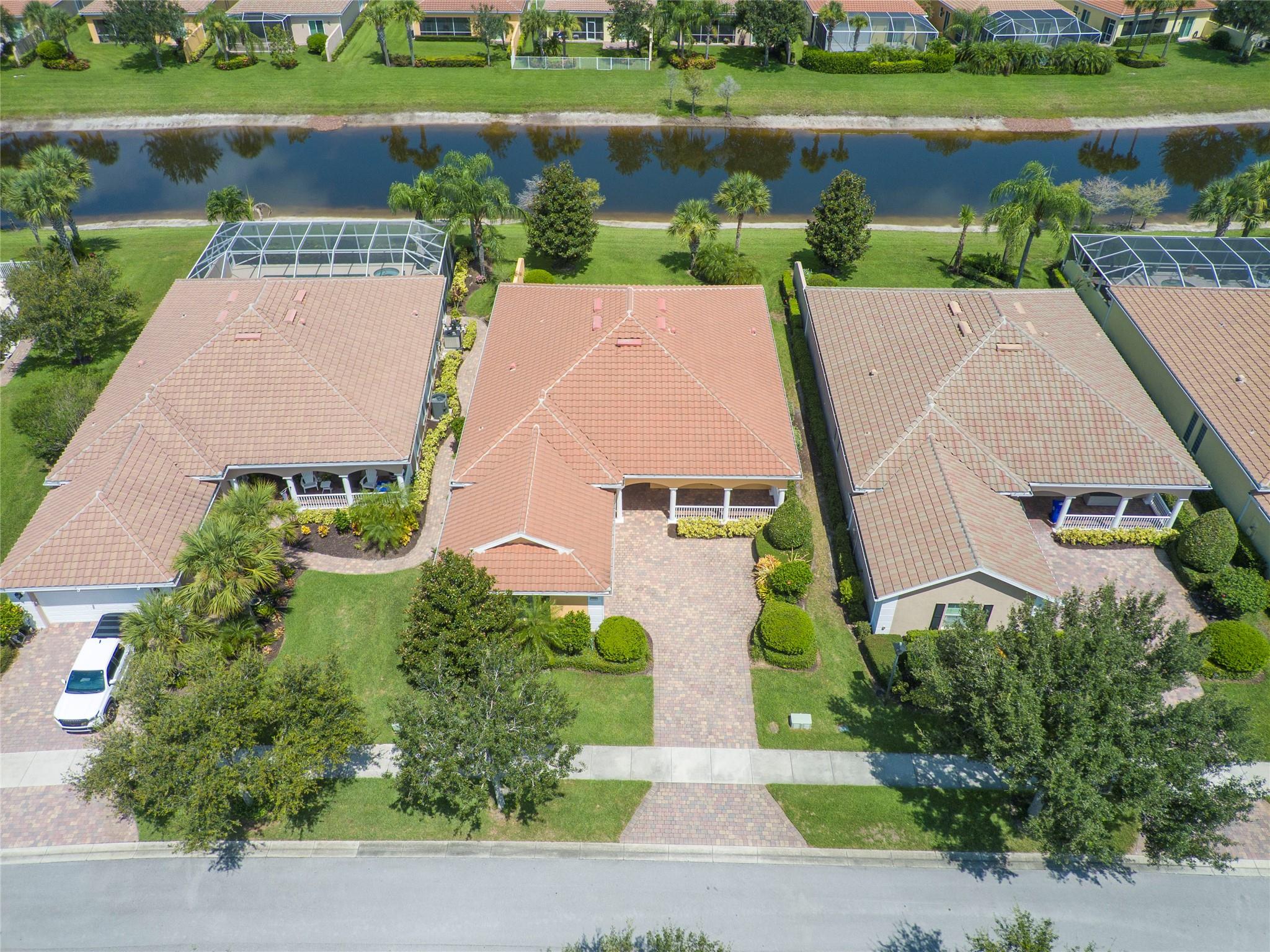 Priced for a remodel, this home is the perfect opportunity to add your personal touch. Bring your flooring person and your favorite painter to transform this space into your dream home. Located in the desirable Isles at Waterway Village and set on the lake, it offers solid bones, a great layout, serene water views, and the added security of a built-in safe room—a blank canvas waiting for your vision! Well, not really blank, it just needs work!