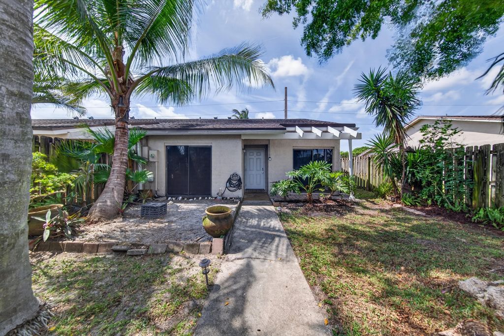 Photo of 1036 E Lakes Drive, Pompano Beach, FL 33064 (MLS # B26029985)