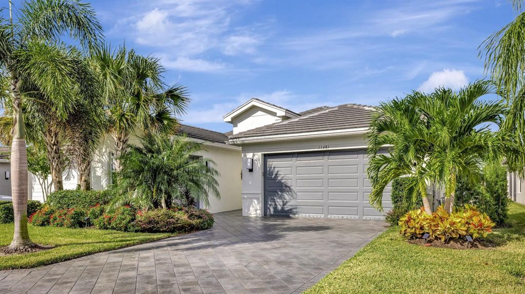 Photo of 11481 SW Half Moon Lake Lane, Port Saint Lucie, FL 34987 (MLS # R10925405)