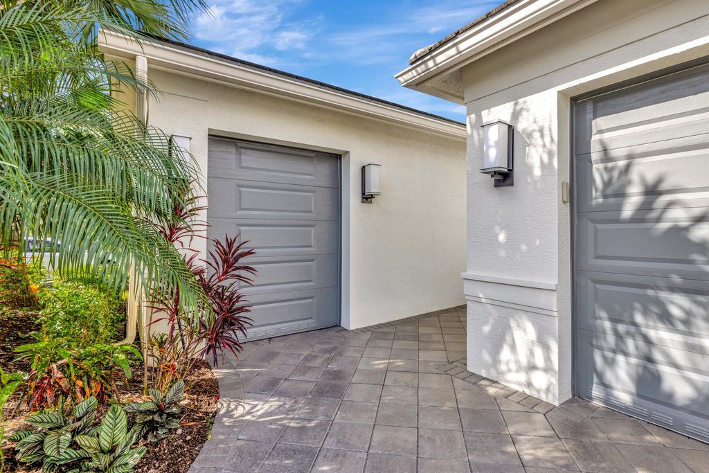 Photo of 11481 SW Half Moon Lake Lane, Port Saint Lucie, FL 34987 (MLS # R10925405)