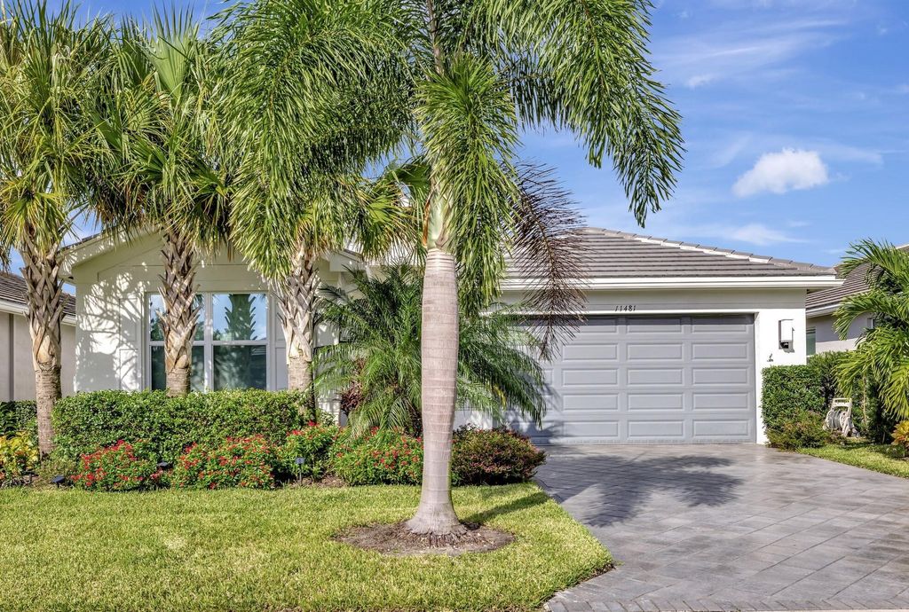 Photo of 11481 SW Half Moon Lake Lane, Port Saint Lucie, FL 34987 (MLS # R10925405)