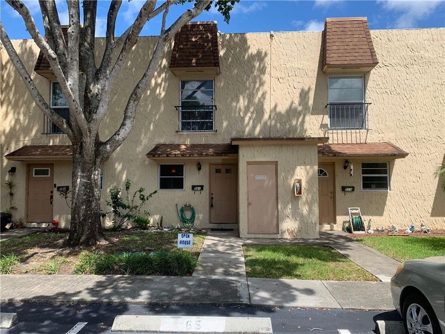 Price Reduced & Priced to Sell.  Quiet and Peaceful Garden Style Townhome located in central Plantation.  2 story, 2 bedroom and 1 and 1/2 bathrooms.  1/2 bath conveniently located on 1st floor.  "BRAND NEW" A/C system.  Washer and Dryer conveniently located on 2nd floor.  Large pool that is well maintained.  Turn key living with this Townhome.  Private complex, but conveniently located to numerous shopping centers.  Screened in back porch.  Balcony off 2nd floor.  Rear of townhome overlooks a lagoon.