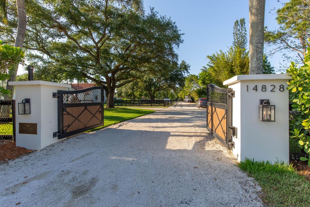 Photo of 14828 Rolling Rock Place, Wellington, FL 33414 (MLS # B26000919)