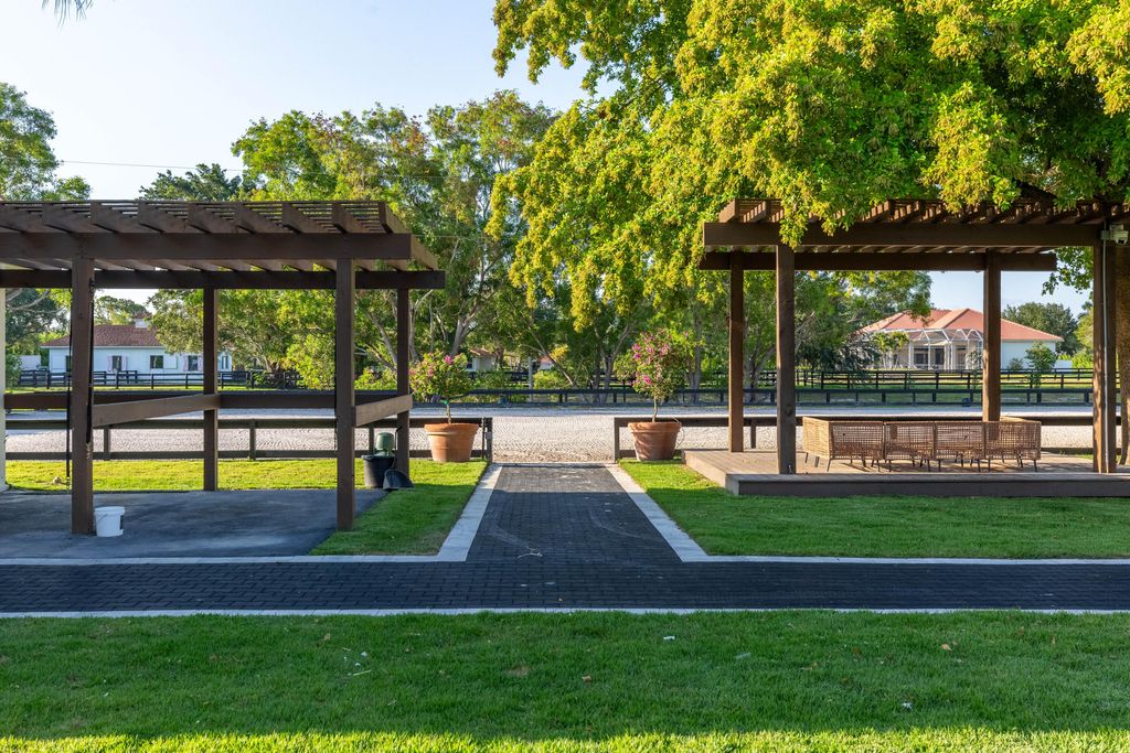 Photo of 14828 Rolling Rock Place, Wellington, FL 33414 (MLS # B26000919)