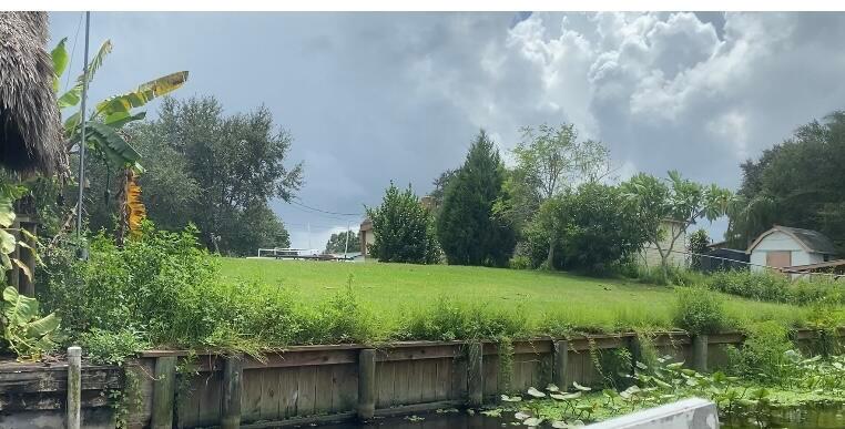 Direct Lake Okeechobee access without any bridges to the locks. Property is ready to be built on. No HOA, so bring your boats, RV and toys. Fisherman's Paradise! Recent Sea Wall and Drainfield. Mature shade trees in the front of the property. Concrete slab in place. No appointment required.