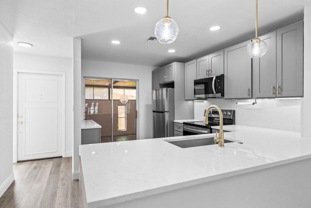 Photo of 5844 Moss Court #9, Fort Pierce, FL 34982 (MLS # R11027354)