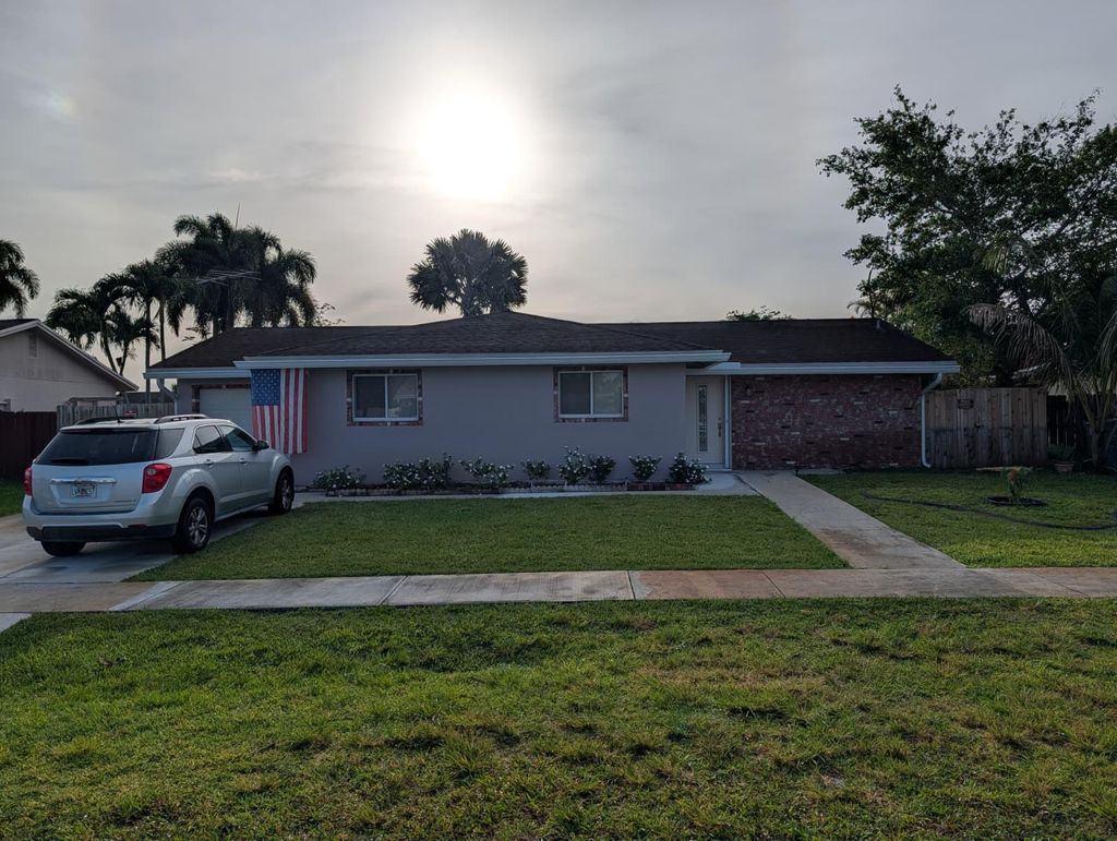Photo of 22776 Neptune Road, Boca Raton, FL 33428 (MLS # B26028465)