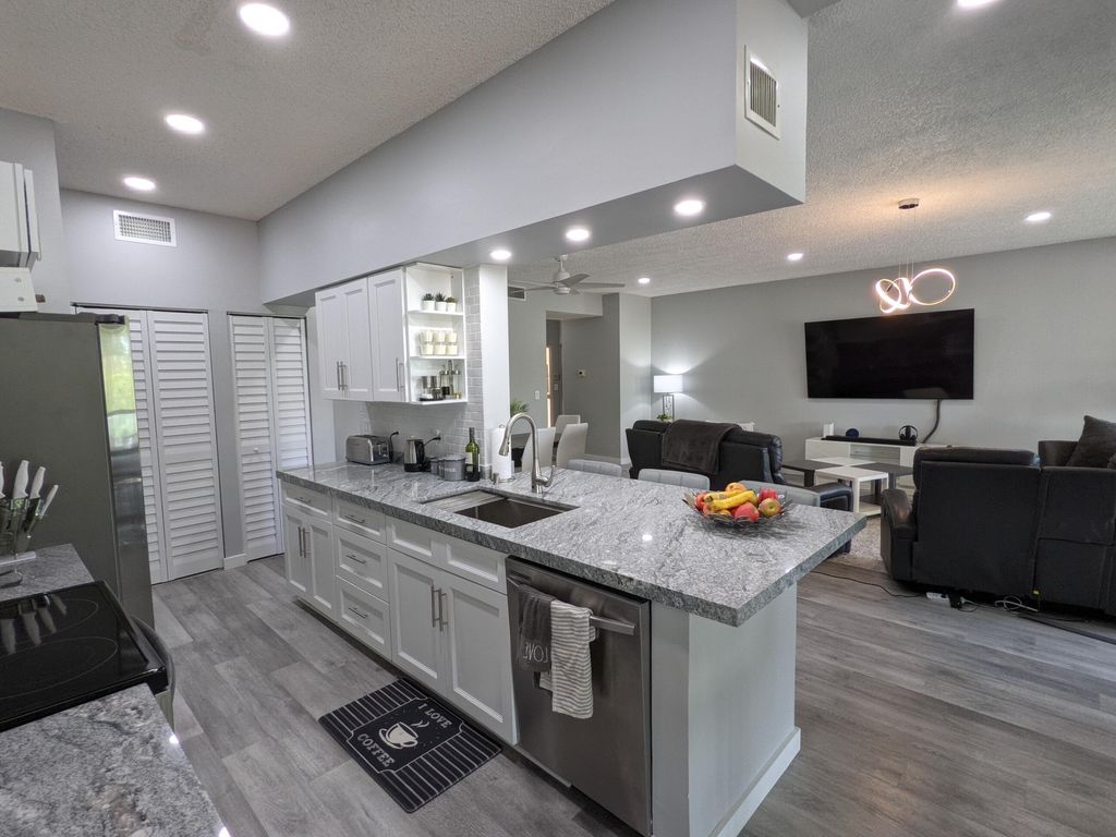 Photo of 105 Half Moon Circle #F2, Hypoluxo, FL 33462 (MLS # B26037198)
