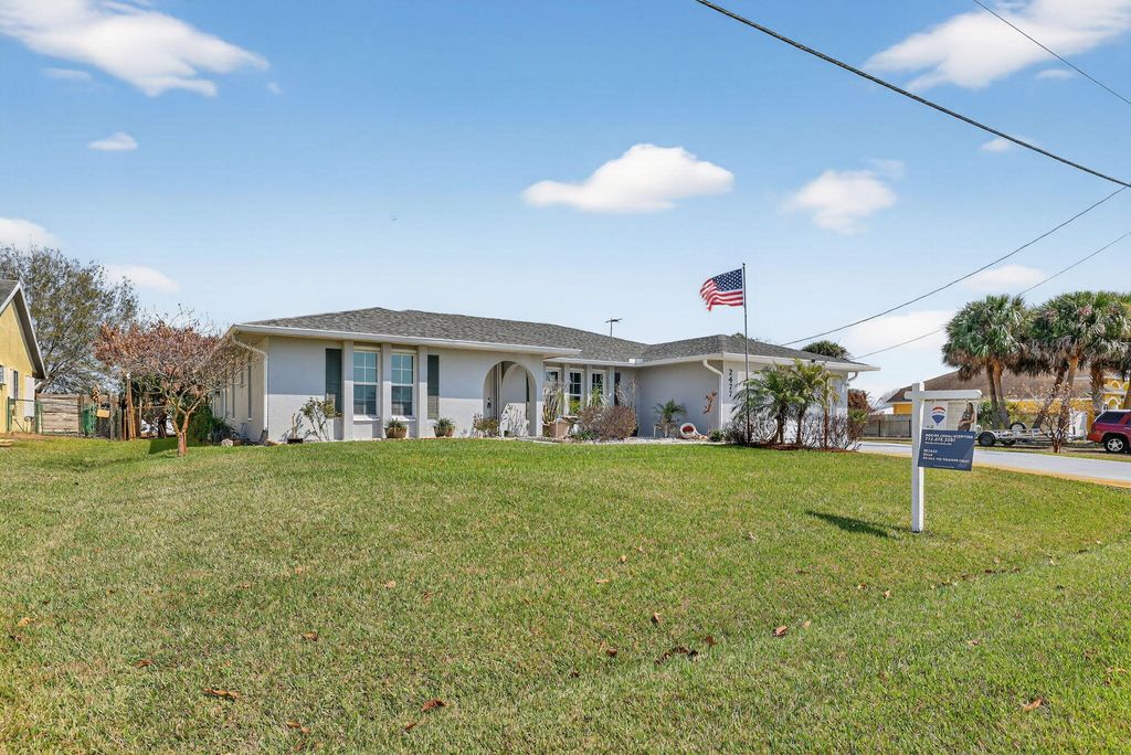 Photo of 2477 SW Chestnut Lane, Port Saint Lucie, FL 34953 (MLS # R11167075)