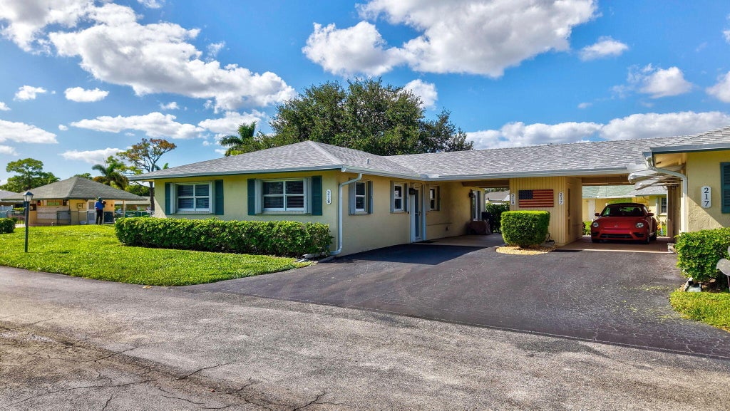 Photo of 218 Cardinal Lane, Delray Beach, FL 33445 (MLS # B26091083)