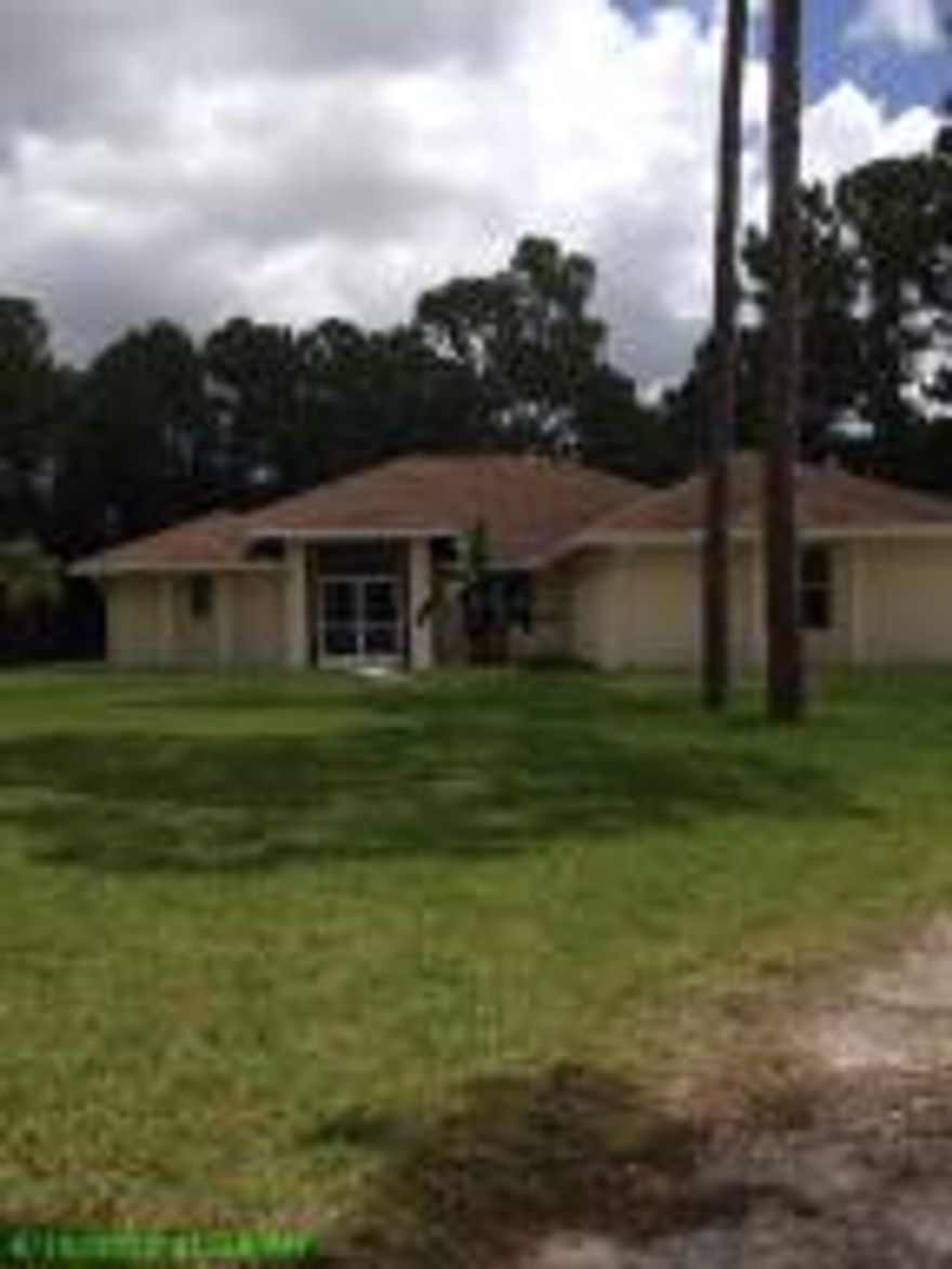 This home has been just given a fresh interior and exterior coat of paint. Great interior design.  Perfect for the owner who needs substantial garage space. The home has a 900 square foot detached garage and a two car attached garage. Make your appointment before it is too late.