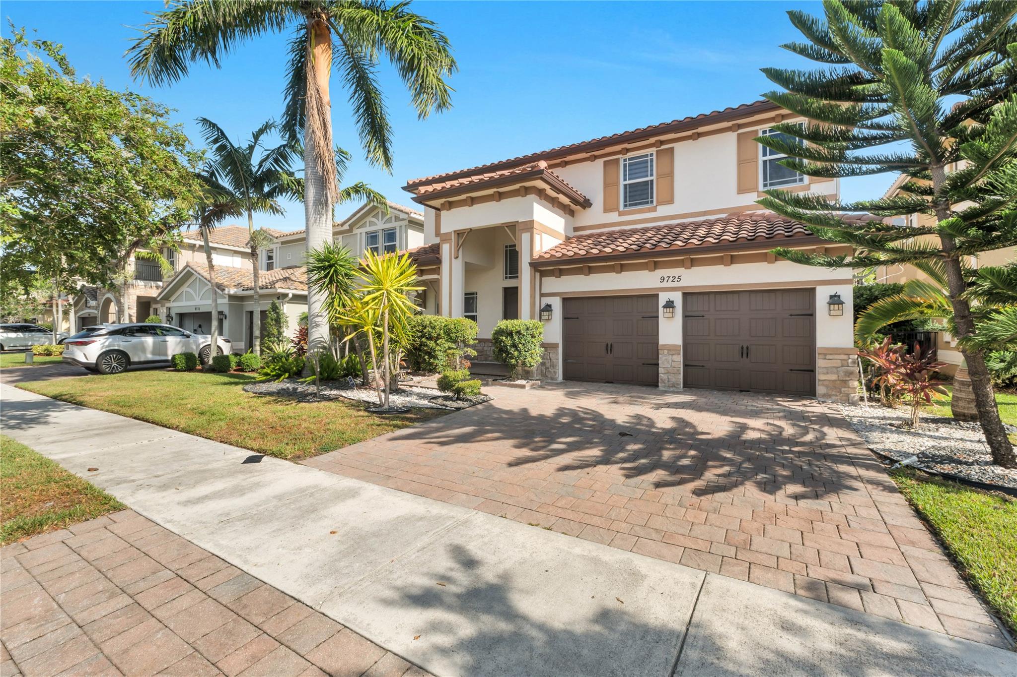 Move in Ready Home with Long Lakeview located in the 24 Hours Security Guard Gated & Resort Style Community. High Ceiling. Plantation Shutter Blinds throughout the Whole House. one bedroom with full bath downstairs. Beautiful & Professional designed landscaping. Impact Windows & Doors throughout the whole house. HOA Fee included 2 club houses and Lawncare front and back. Indoor Basketball court, GYM, Tennis Court. No Rental Restriction. Great A School zoned. Huge backyard with plenty room for a Pool. A Must See!