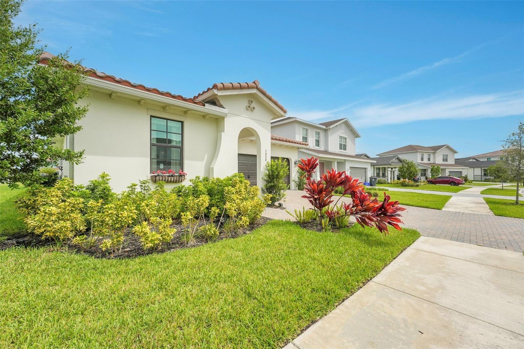 Photo of 1878 Wandering Willow Way, The Acreage, FL 33470 (MLS # B26040145)