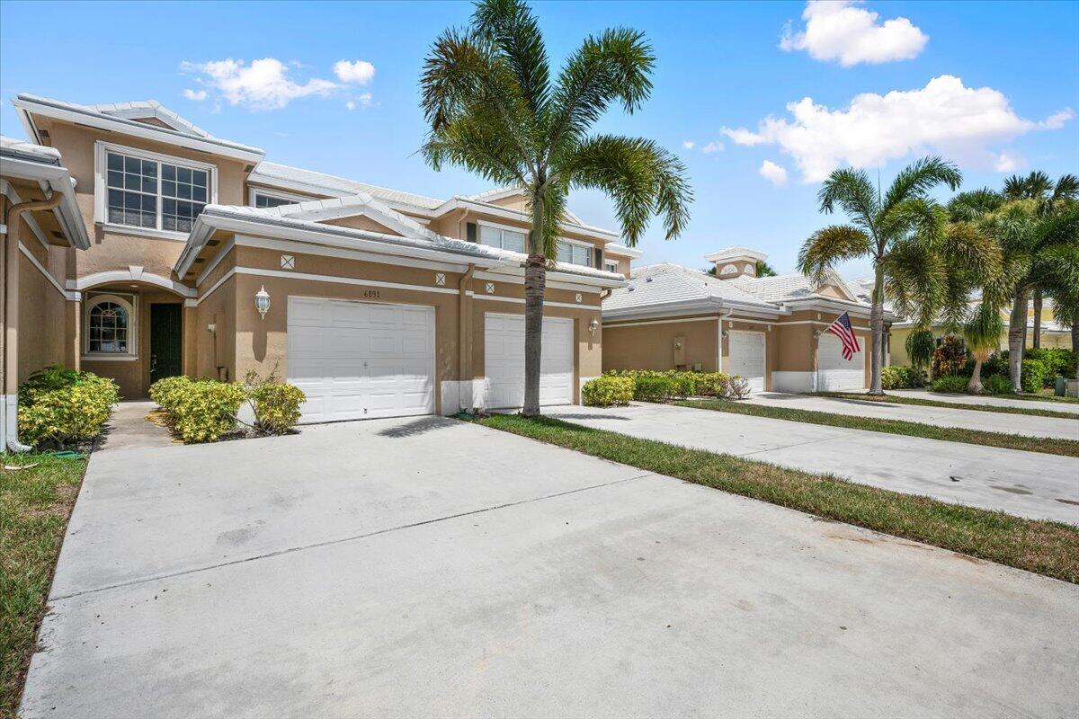 Located in a gated community with a neighborhood pool, playground, and quiet cul-de-sac setting, this spacious 3-bedroom, 2.5-bath townhome with a one-car garage. Recently refreshed with a brand-new roof and fresh interior paint, this home is move-in ready and waiting for its next chapter. Step inside to find an inviting layout that includes a dedicated air-conditioned laundry room and a convenient half bath on the main floor, perfect for guests. The bright kitchen and living areas flow effortlessly. Upstairs, you'll find three full bedrooms, including a generous primary suite with a large walk-in closet and a completely updated walk-in shower in the private bath. For added security and ease, the home also features accordion hurricane shutters and a built-in alarm system.
