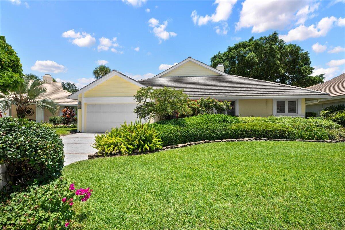 Discover your dream home in the sought-after Crosswind community of prestigious Jonathan's Landing! This 2-bedroom, 2.5-bath residence offers a layout ideal for comfortable living and elegant entertaining. Enjoy a bright living room with charming wood burning fireplace, inviting dining area and French Doors to a tranquil screened patio, updated kitchen with newer cabinets, countertops, and appliances. The spacious primary suite features, 2 walk-in closets, ensuite bath with dual sinks and walk in shower and French Doors to the screened patio. The guest suite offers a full bath and dressing area ideal for family or guests. The versatile den, built-in dry bar can easily convert back to a closet for a third bedroom! Relax or entertain on the screened porch with garden view and water feature
