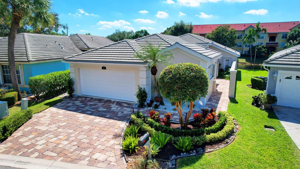 Photo of 120 Harbor Lake Circle, Greenacres, FL 33413 (MLS # R10929651)