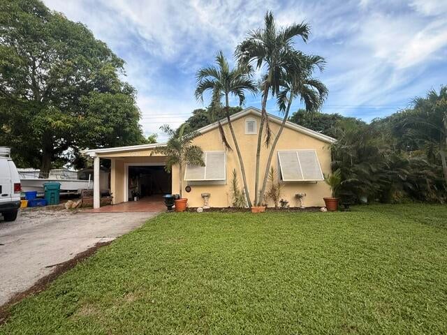 Photo of 520 NW 7TH Street, Boynton Beach, FL 33426 (MLS # B26072718)