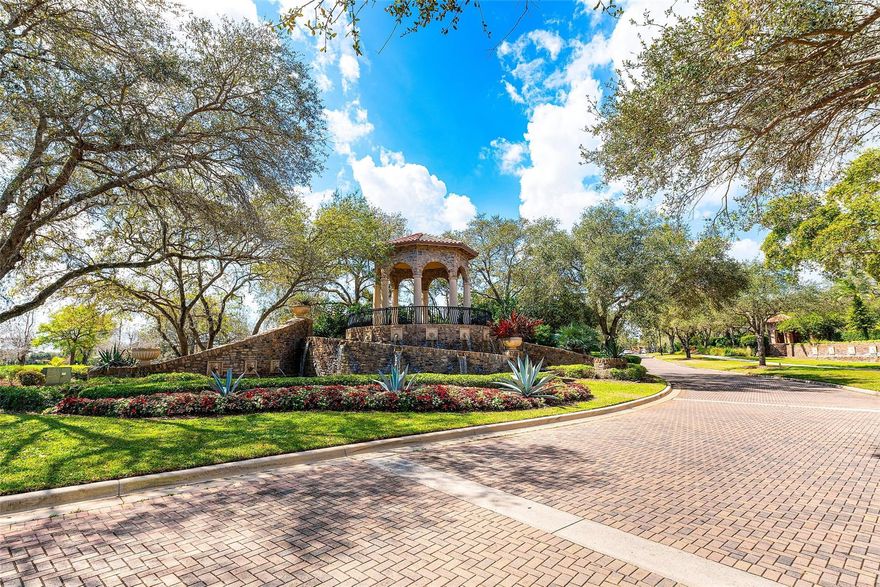 Second-floor Caseras coach home in Parkland Golf & Country Club offering nearly 2,300 sq ft of living space. Features 3 bedrooms plus a flexible den ideal for office or guests. Private elevator and interior staircase lead to a bright, open layout with marble floors in main areas and primary suite. Brand new carpet just installed. Spacious kitchen with breakfast area flows into living and dining rooms. Screened balcony overlooks the zen gardens with fountains and pool. Social membership included with access to clubhouses, fitness center, pools, dining, tennis, and pickleball. Country club living at its finest.