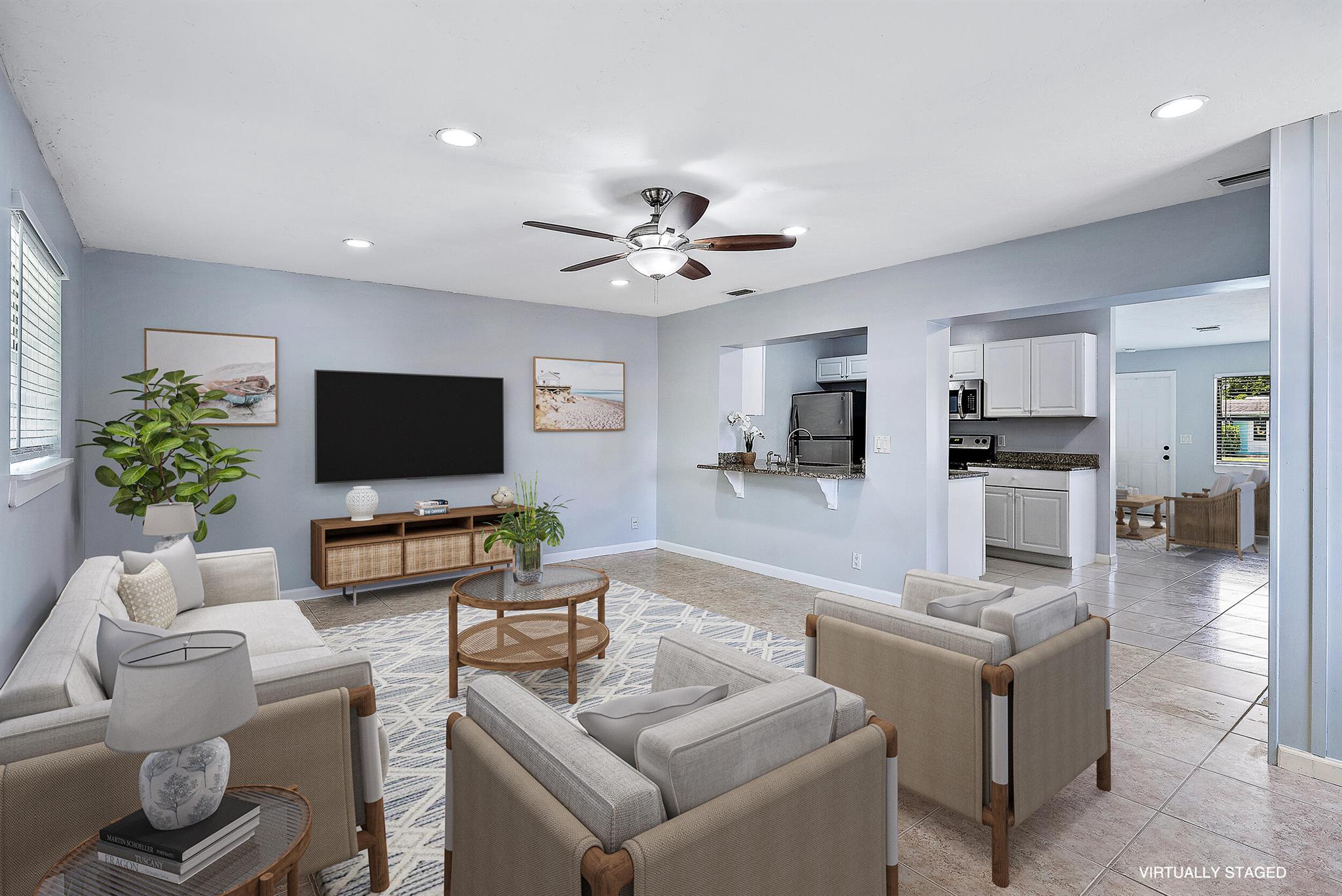 Cute home with coastal blues in a popular community with NO HOA convenient to the best shopping and food in Palm Beach Gardens! This 4-bedroom home has a nice living space open to the kitchen and family room. The master has an updated bathroom and the bedrooms feel spacious. Very close proximity to the Gardens Mall, Downtown at the Gardens, Whole Foods, Trader Joe's, and I-95. Also close to Juno & Jupiter beaches, a boat ramp, and the community park & playground. Come make this home your own!
