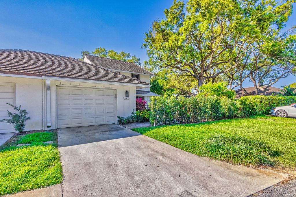 Photo of 11433 Shady Oaks Lane, North Palm Beach, FL 33408 (MLS # R10995654)