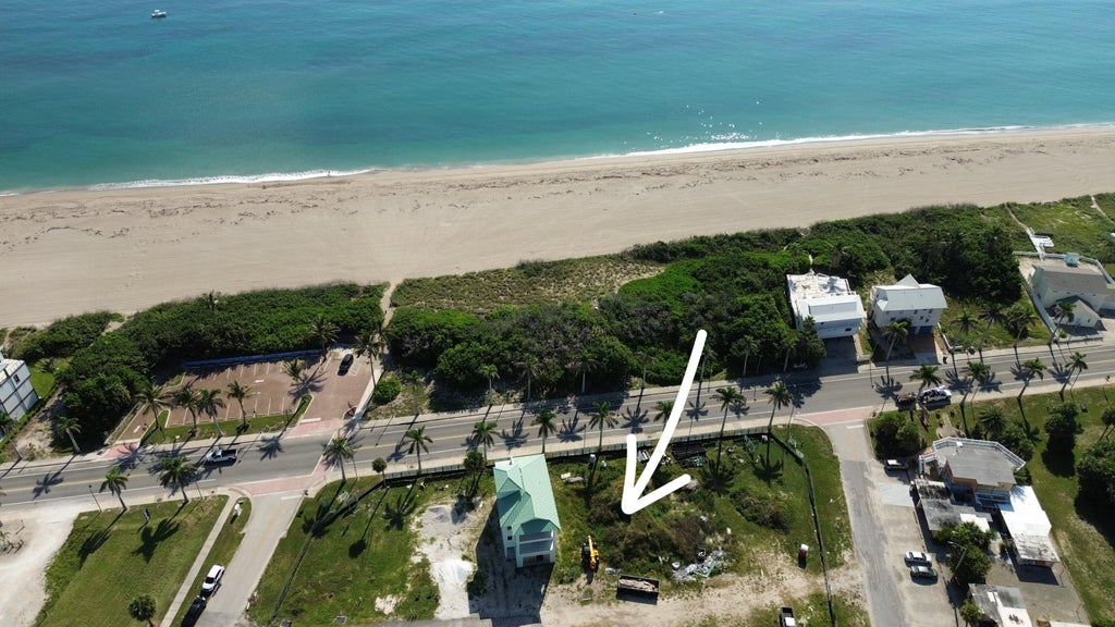 Photo of 523 Coral Sands Way, Hutchinson Island, FL 34949 (MLS # R11168702)