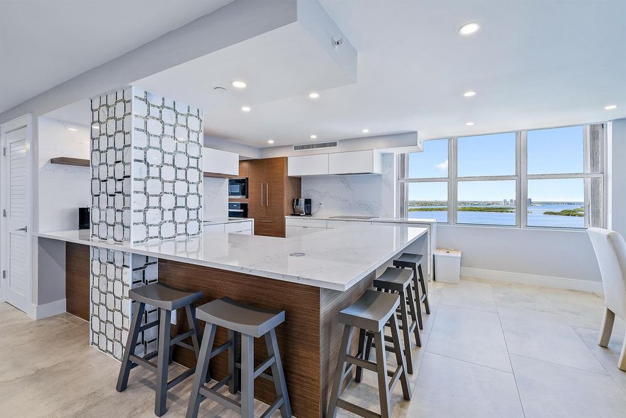 Wake up to the gentle sound of waves and the first rays of sunrise spilling across the Atlantic. This 3-bedroom, 3.5-bath oceanfront sanctuary offers nearly 2,700 sq. ft. of pure coastal elegance--every inch thoughtfully updated to the highest standard, unlike any other unit in the building.From the moment you step inside, the ocean greets you with sweeping, uninterrupted views, while the Intracoastal shimmers in the distance, catching the golden glow of sunset. With water views from every room, life here is a constant reminder of the beauty just beyond your windows.