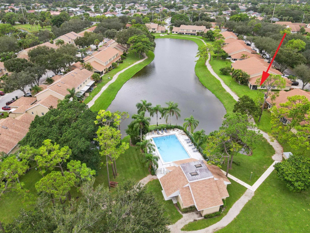 Photo of 2401 Maplewood Drive, Greenacres, FL 33415 (MLS # R11029610)
