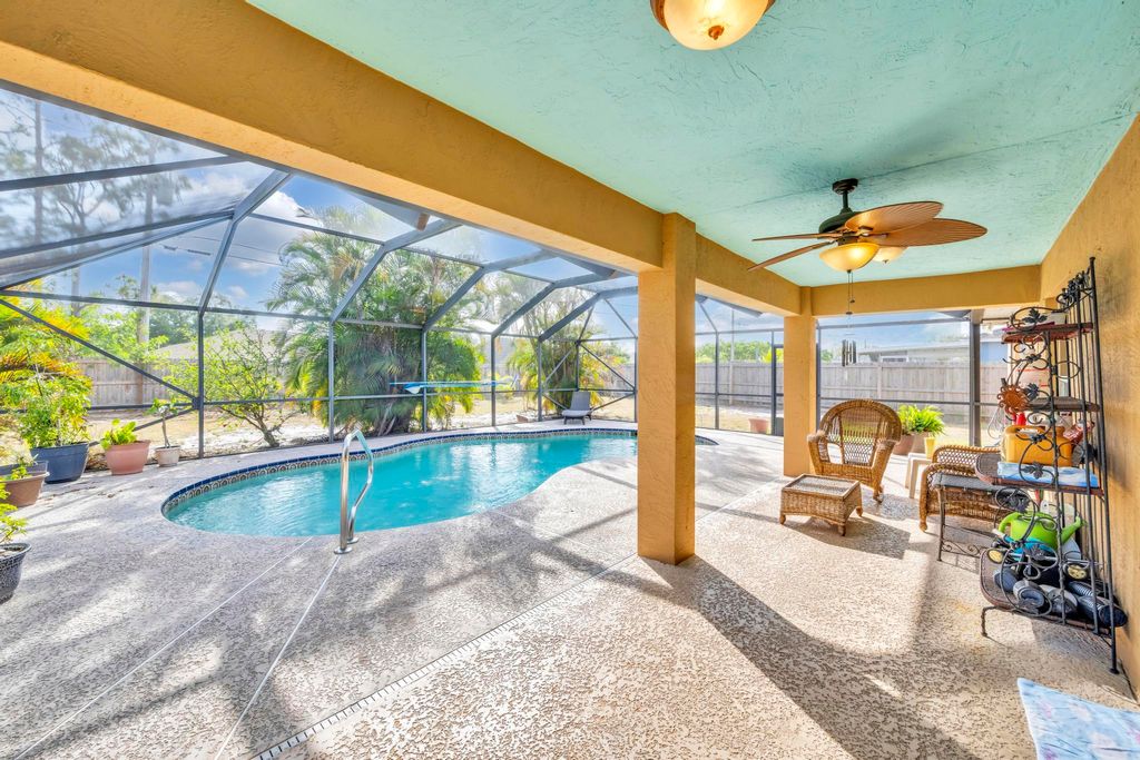 Photo of 214 SW Milburn Circle SW, Port Saint Lucie, FL 34953 (MLS # R10981921)