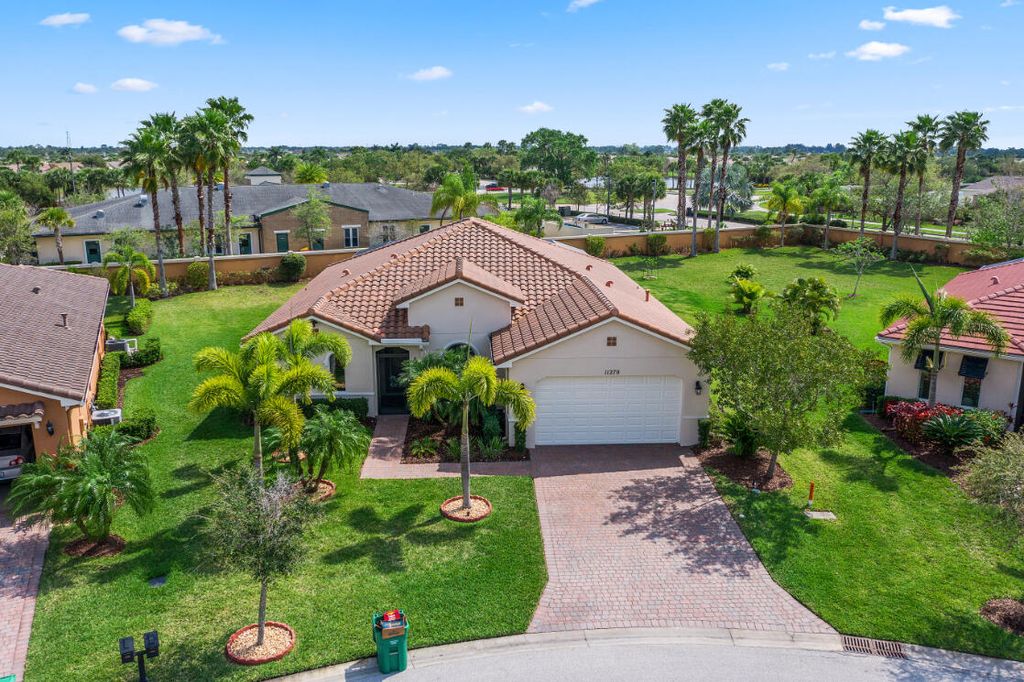 Photo of 11270 SW Apple Blossom Trail, Port Saint Lucie, FL 34987 (MLS # R10784116)