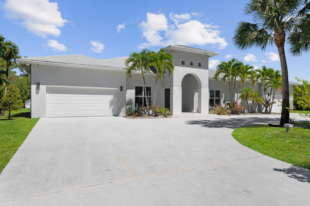 Photo of 15503 Temple Boulevard, Loxahatchee, FL 33470 (MLS # B26048864)
