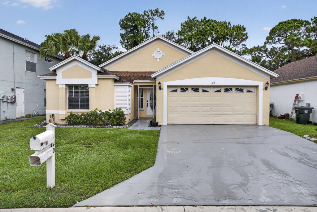 Photo of 120 PADDOCK Lane, Greenacres, FL 33413 (MLS # B26055007)