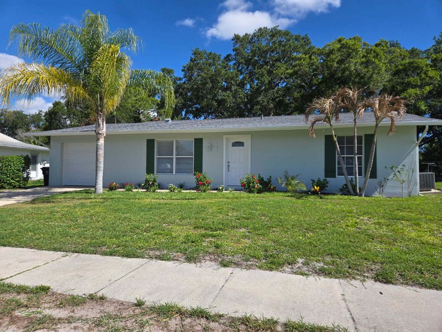 Step into this totally remodeled move in ready home, where no  no expense was spared. The Kitchen features high-end finishes    and all new Appliances, while both bathroom have been complety redesigned with contemporary, elegant touches. Enjoy new flooring throughout. Whole house is bright & airy interior that feels both stylish and inviting.  Sun filled Great room offers Large windows & slider that open to a spacious large back yard and patio, Perfect for relaxing or entertaining. Located in a desirable neighborhood Sidewalk lined streets. Residents can take a short walk to community pool, and Library nearby play grounds, shopping, schools daycare dinning. With a new roof replaced in 2022. This home offers peace of mind and easy living at it's best.   Come view this exceptional home