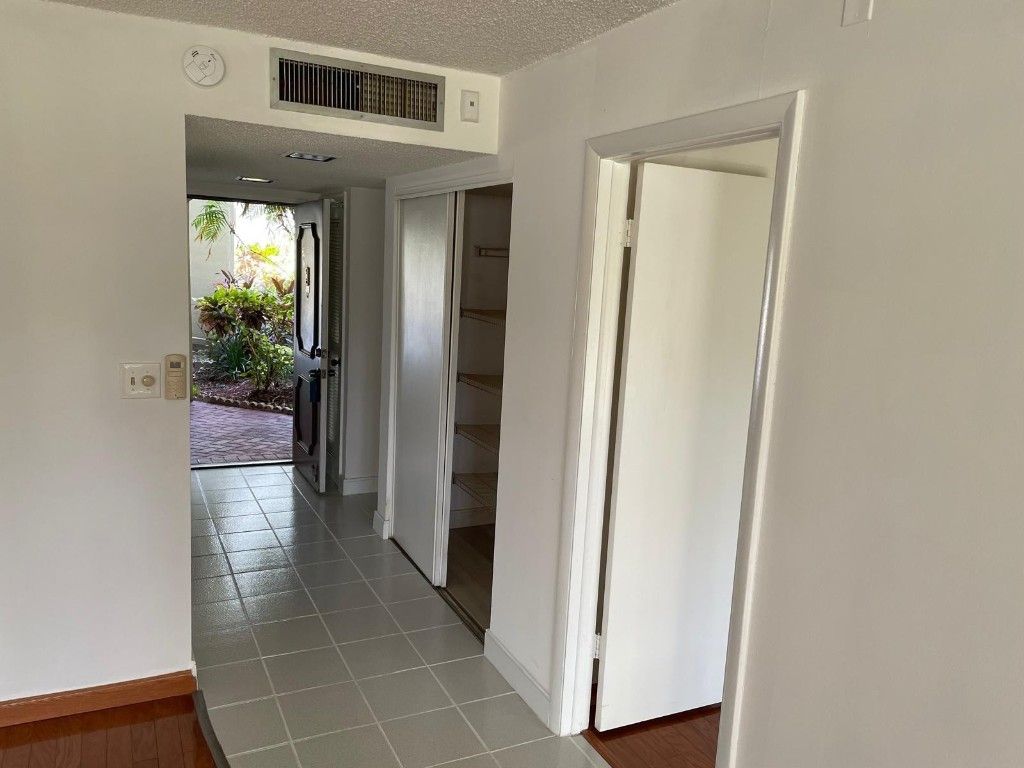Photo of 2322 S Cypress Bend Drive #110, Pompano Beach, FL 33069 (MLS # F10477052)