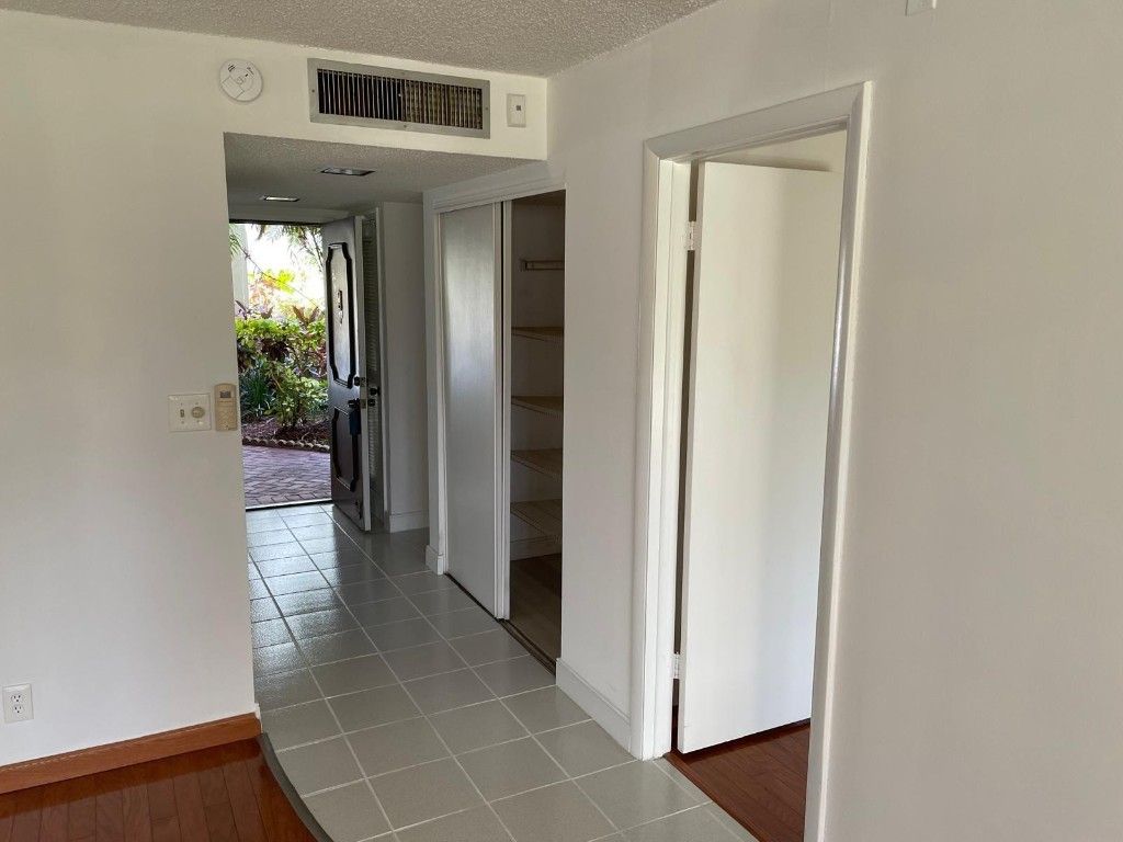 Photo of 2322 S Cypress Bend Drive #110, Pompano Beach, FL 33069 (MLS # F10477052)