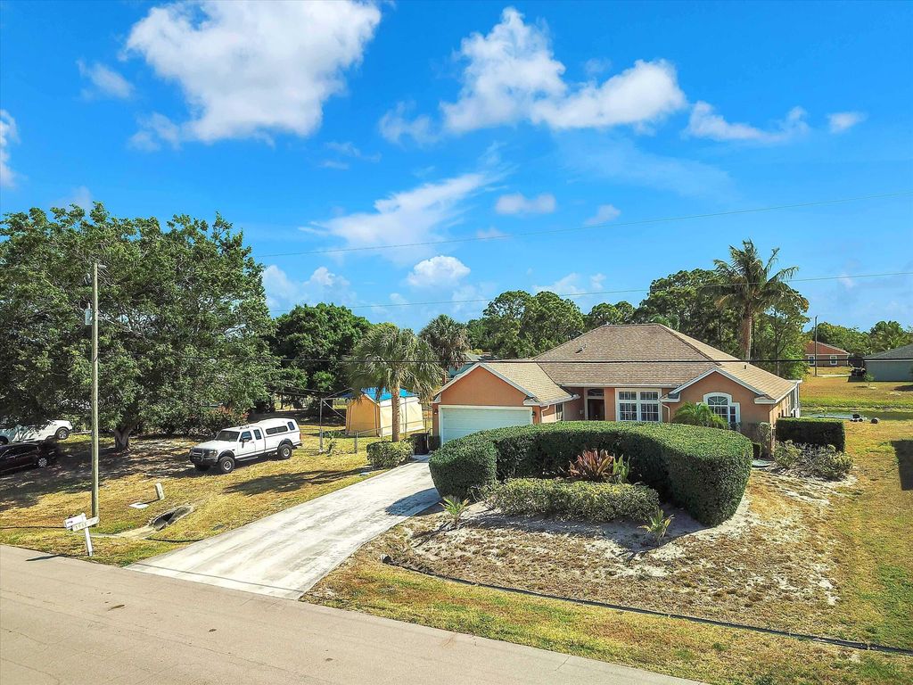 Photo of 1955 SW Castinet Lane SW, Port Saint Lucie, FL 34953 (MLS # R11114910)