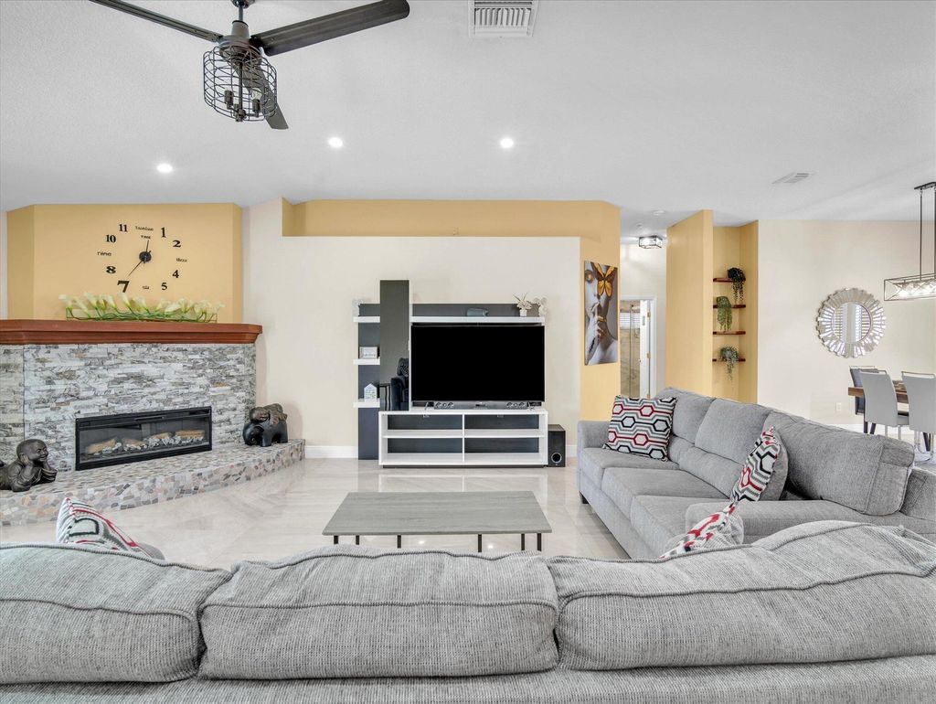 Photo of 1955 SW Castinet Lane SW, Port St Lucie, FL 34953 (MLS # R11114910)