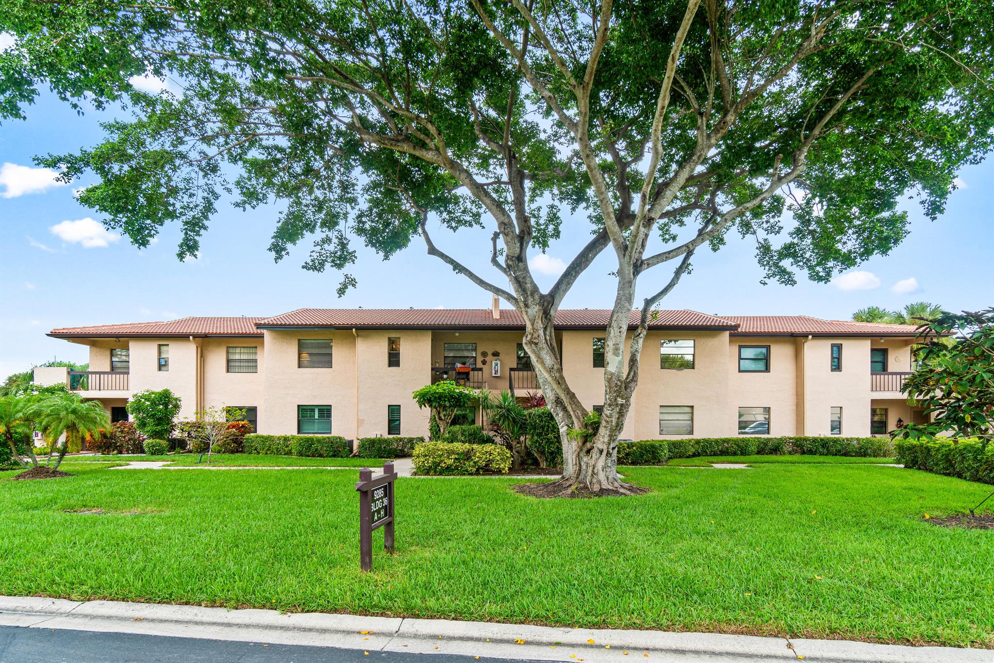 Welcome to boutique lakeside living in this exclusive 55+ community of Boca Lago. Set along the peaceful lakefront, this intimate condominium offers a perfect balance of comfort, elegance, and a relaxed lifestyle. This Move-in ready condo, recently freshly painted, this home features tile flooring throughout the main living areas and luxury vinyl in the bedrooms for a stylish and low-maintenance finish. Residents enjoy stunning water views, and a warm, neighborly atmosphere. Designed with convenience in mind, the community provides easy access to shopping, dining, and cultural attractions while offering the tranquility of lakeside living. Whether you're watching the sunset from your private balcony or connecting with neighbors in a quiet setting, this home offers the lifestyle