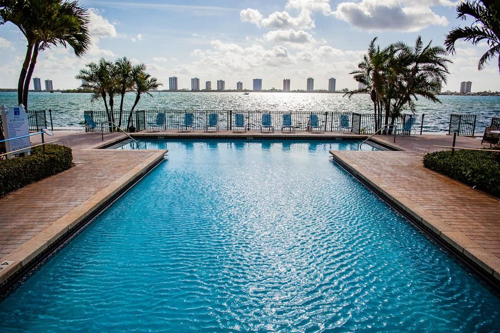 Photo of 1140 Lake Shore Drive #102, Lake Park, FL 33403 (MLS # R10713089)