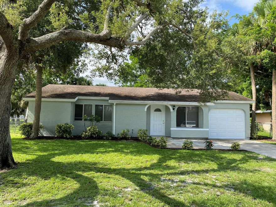 Move in ready! Wonderful, light and bright 3 Bedroom 2 bath home in the Vero Beach Highlands Community. Freshly painted inside and out. Wood laminate and tile flooring throughout.Good sized family room with separate dining area. Beautiful kitchen with newer cabinets and granite counter tops. All new  stainless steel appliances. Renovated master and guest baths. New screened in porch overlooking large fenced in yard. Additional shed in back with lawnmower. Great community with pool, tennis courts, exercise room, playground, and club house. Centrally located, close to shopping and schools.