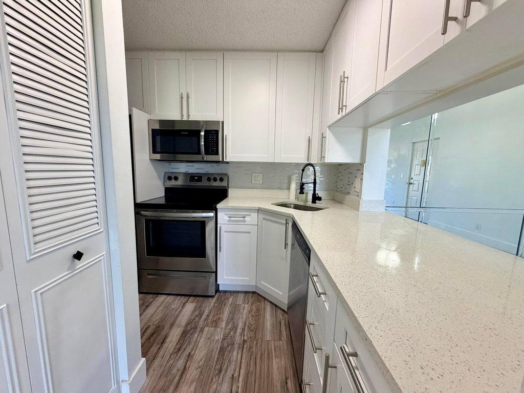 Photo of 616 Sea Pine Way #C3, Greenacres, FL 33415 (MLS # B26046538)