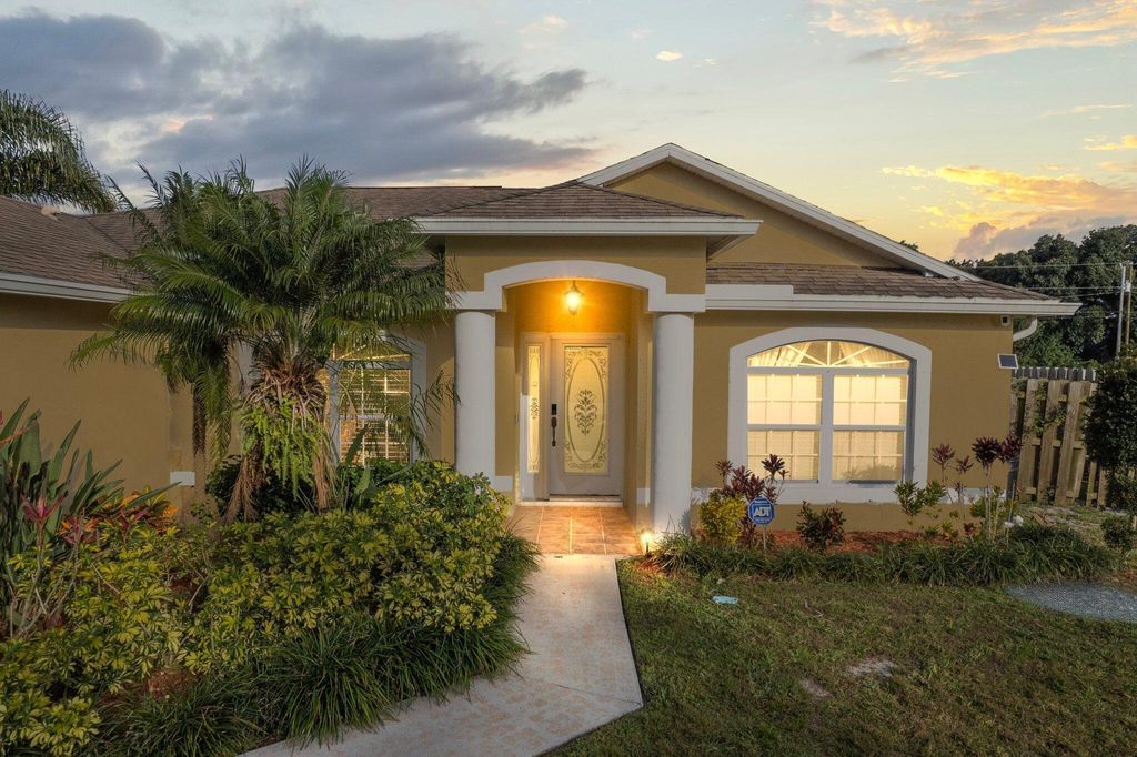 Photo of 2317 SE Rock Springs Drive, Port Saint Lucie, FL 34952 (MLS # R11080597)