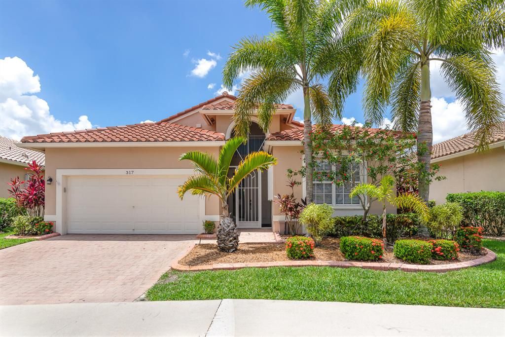 Photo of 317 NW Shoreview Drive, Port Saint Lucie, FL 34986 (MLS # R10816494)