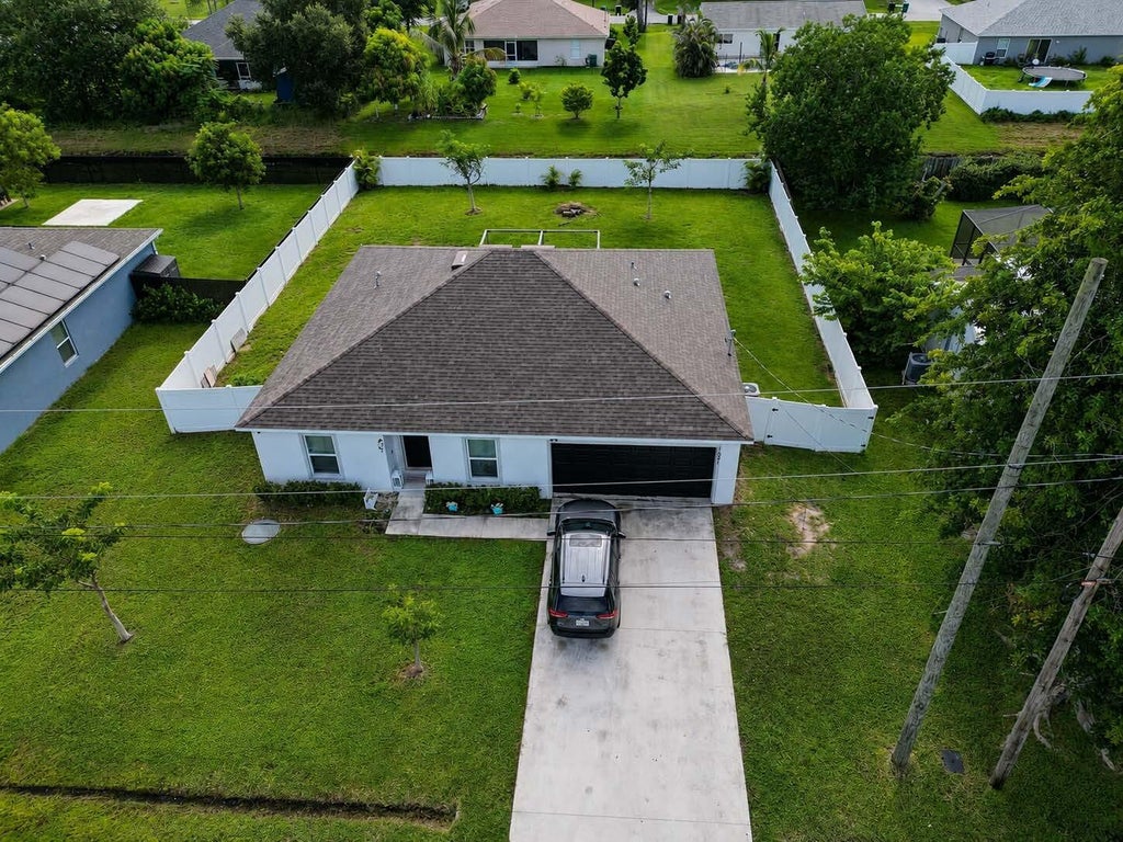 Photo of 1921 SE JOYNER Circle, Port Saint Lucie, FL 34952 (MLS # B26071212)