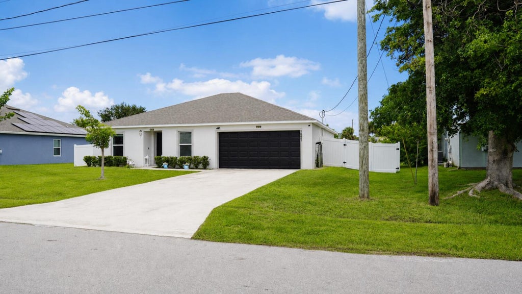 Photo of 1921 SE JOYNER Circle, Port Saint Lucie, FL 34952 (MLS # B26071212)