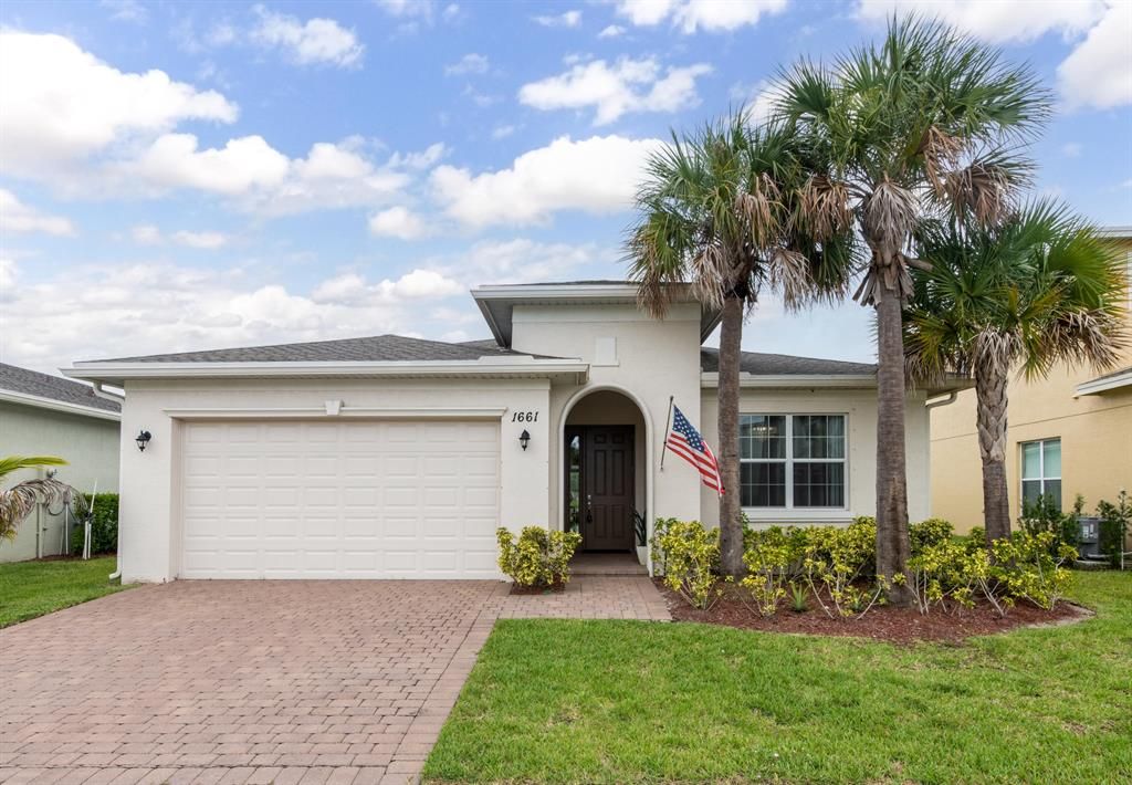 Photo of 1661 NW Vivanco Street, Port Saint Lucie, FL 34986 (MLS # R10819040)