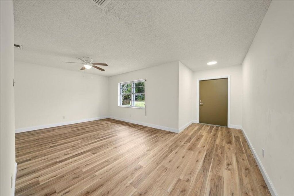 Photo of 7406 Pacific Avenue, Fort Pierce, FL 34951 (MLS # R11020542)