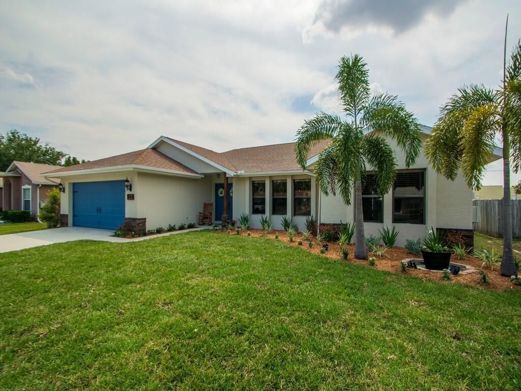 Photo of 944 SE Odonnell Lane, Port Saint Lucie, FL 34983 (MLS # R10709354)